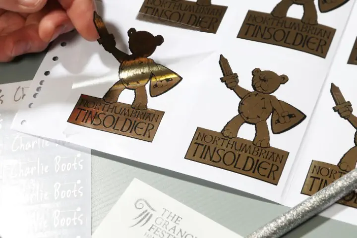 Metallic black and gold bear stickers