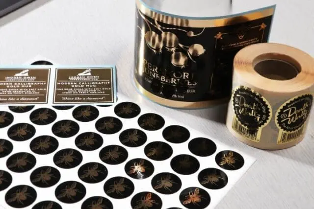 Metallic gold stickers on sheets and rolls