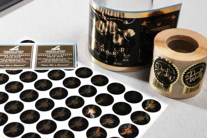 Metallic gold stickers on sheets and rolls