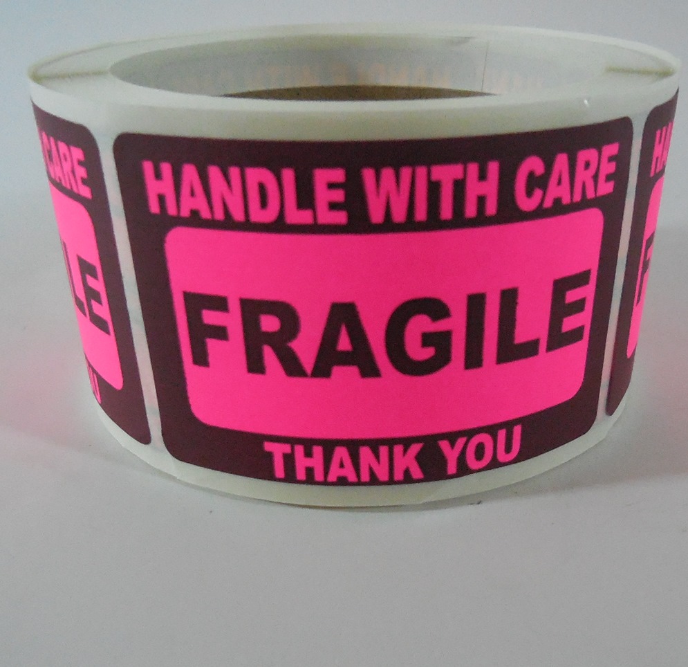 roll of fluorescent fragile labels